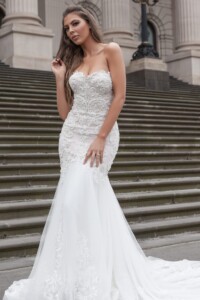 Sise 10 to 12A two-tone bodice with luxurious beading the skirt is a soft tulle with lave edge detailing Bride Dress Rental
