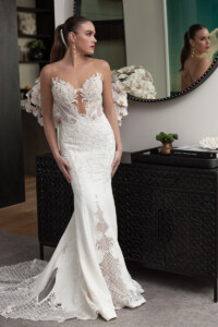 Size 8 to 10Low deep V with pearl lace and fitted crepe skirt