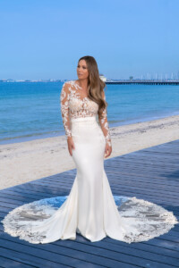 size 10 to 12Illusion long sleeve skin tone bodice with crepe fitted skirt. wedding dress rental Melbourne