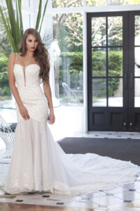 size 10 to 12A satin fitted gown with beaded of Pearl the train has a lace edge detail Designer bridal gown rental Melbourne